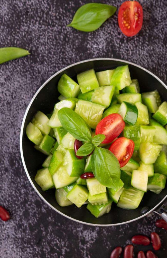cucumber-stir-fried-with-tomatoes-red-beans-frying-pan_1150-24298